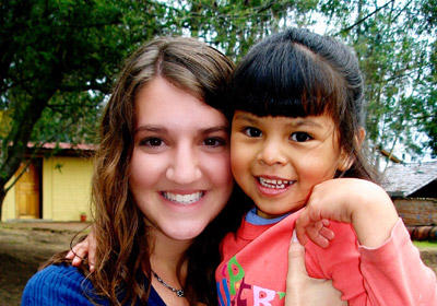 Woman holding an Ecuadorian child