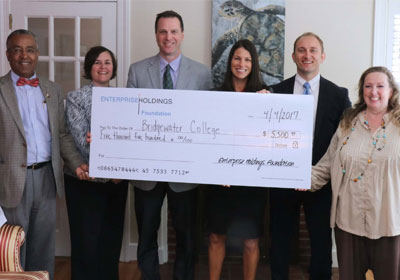 Group accepting a large check