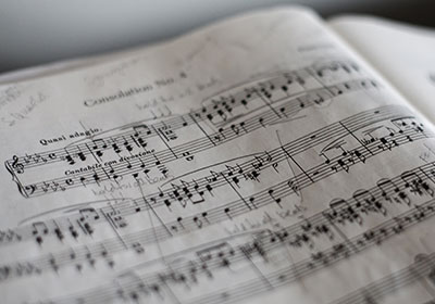 Photo of a piece of sheet music|Photo of the Jazz Ensemble|Photo of a piece of sheet music