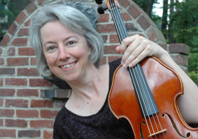 Molly Sharp of the Richmond Symphony holds her viola