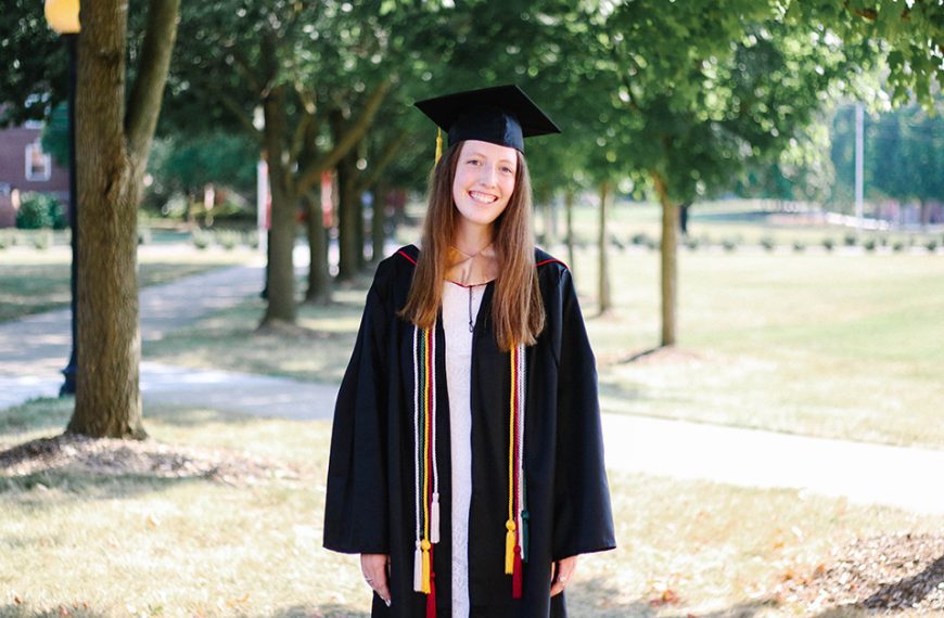 Sarah Riley wearing a graduation cap and gown