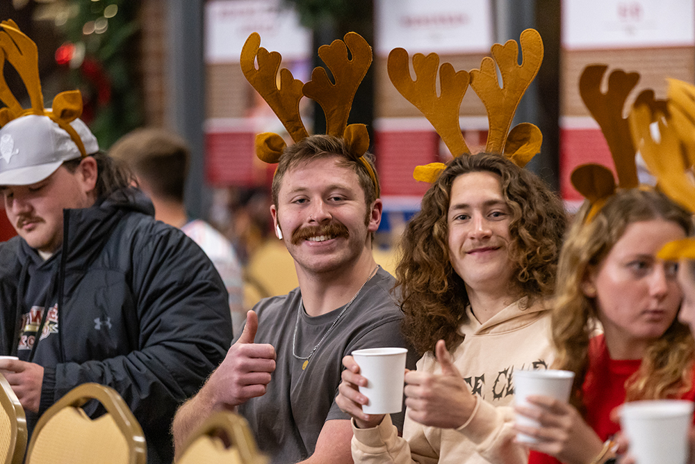 Students wearing antler ears during Journey of Lights