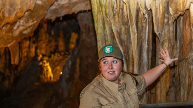 Hayley Savage giving a tour of Grand Caverns